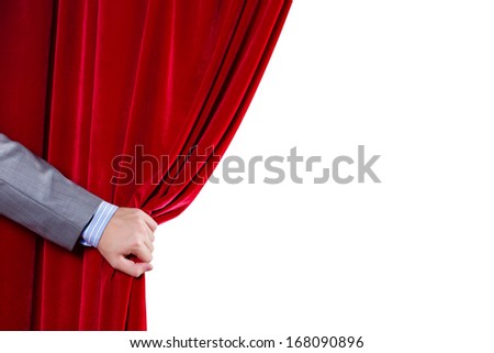 Close Up Of Hand Opening Red Curtain. Place For Text