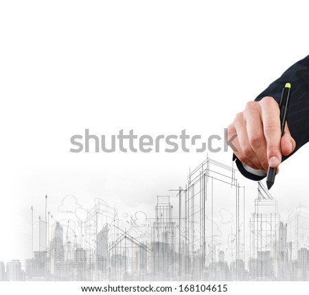 Close up of businessman hand drawing sketches of buildings