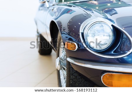 Close up image of car headlight. Front view