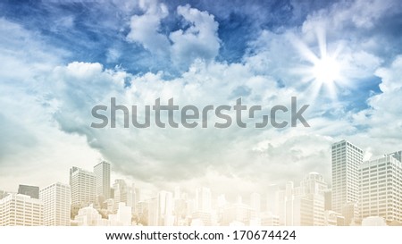 Urban scene with buildings and skyscrapers in sunlight