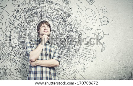 Young Thoughtful Handsome Man In Casual Thinking Over The Ideas