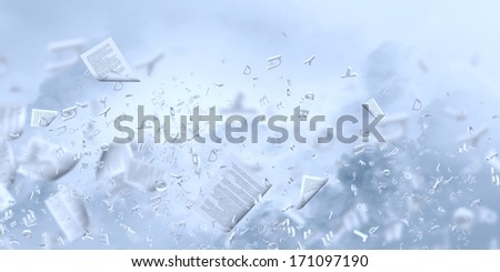 Background conceptual image with papers flying in air