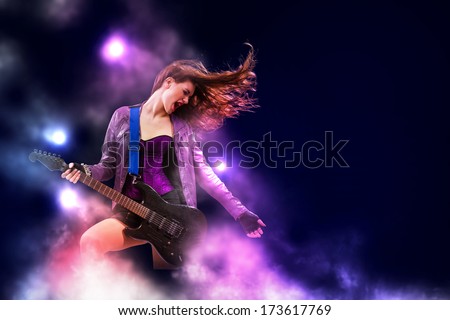 Rock passionate girl with wings and color splashes