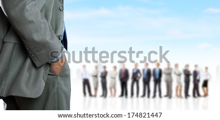 Bottom image of businessman with people at background