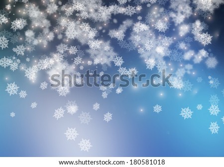 Conceptual image with snowflakes on blue background