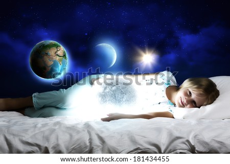 Girl lying in bed with moon in hands. Elements of this image are furnished by NASA