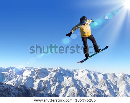 Man on snowboard jumping in sky. Summer vacation