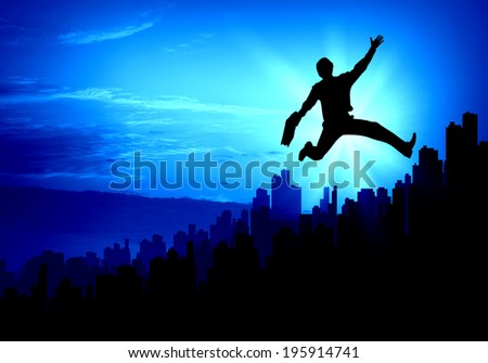 Silhouette of businessman jumping against sunset background