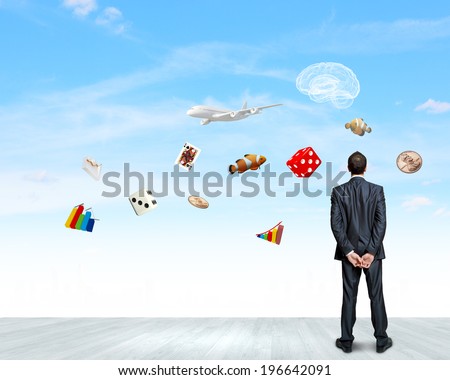 Back view of confident businessman dreaming about future