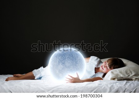 Cute girl sleeping in bed with moon