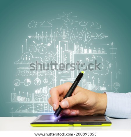 Close up of human hand drawing business strategy plan