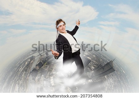 Young funny businessman wearing tie around head