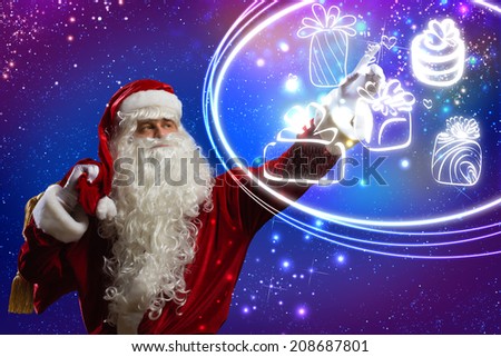 Santa Claus touching icon of media screen
