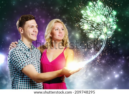 Young happy couple dreaming about family wealth