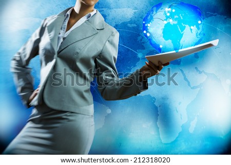 Businesswoman holding papers in hand and media background