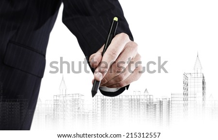 Close up of human hand drawing construction project