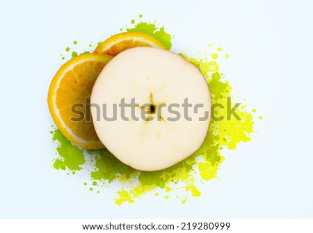 Half of fresh orange and apple on white background