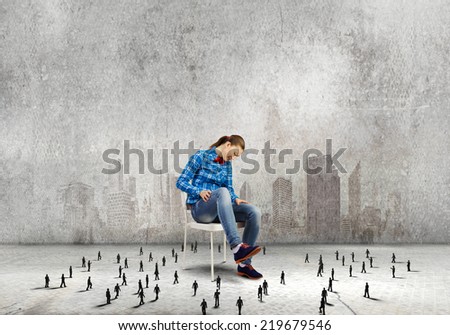 Woman in casual sitting on chair and small silhouettes of businesspeople around