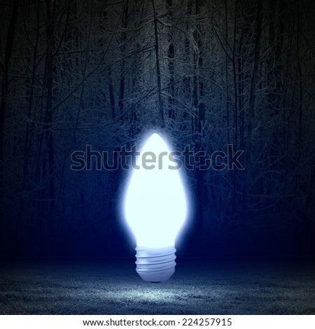 Background image with glowing light bulb. Energy saving