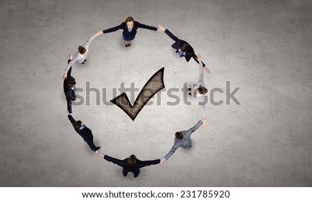 Group of business people standing in circle