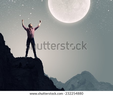 Silhouette of screaming man celebrating success