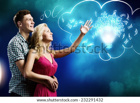 Young happy couple dreaming about future life