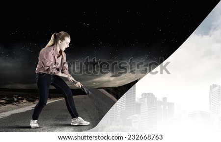Young woman pulling page to change scene