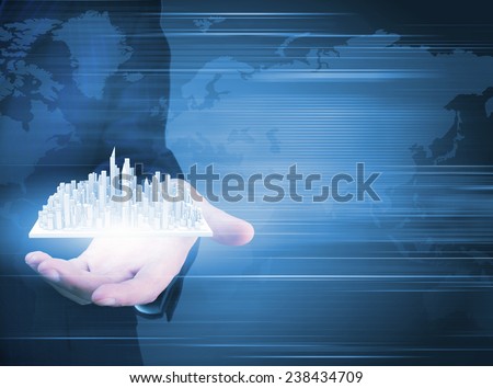 Close up of businessman holding digital construction model in palm