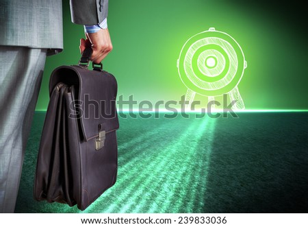 Bottom view of businessman with suitcase in hand