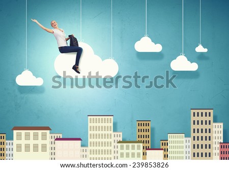 Young pretty girl riding on cloud high in sky