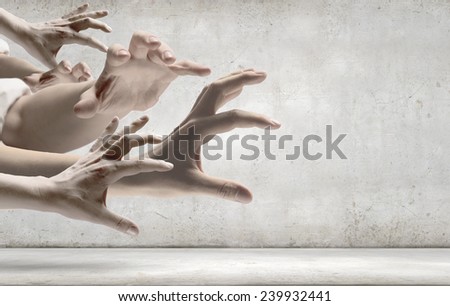 Close up f human hands trying to catch something