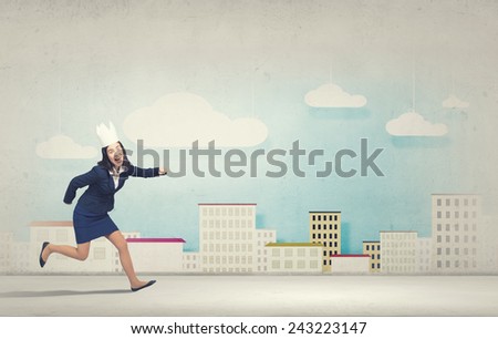 Young businesswoman in paper crown running in a hurry