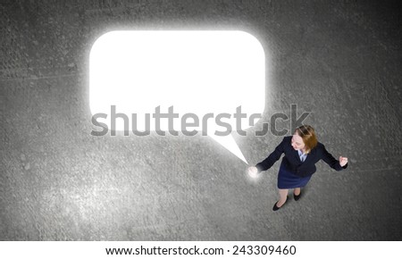 Top view of businesswoman with mobile phone in hand