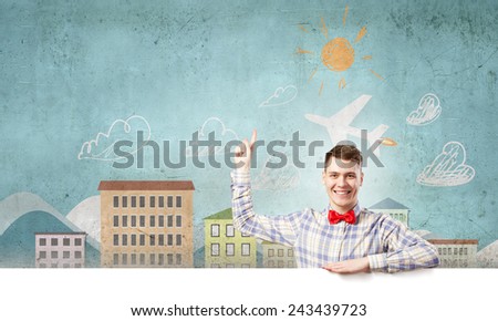 Young man with white blank banner. Place for text