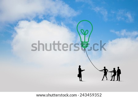 Little silhouettes of people pulling light bulb on rope