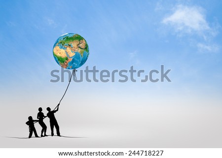 Silhouettes of people pulling Earth plane with rope. Elements of this image are furnished by NASA