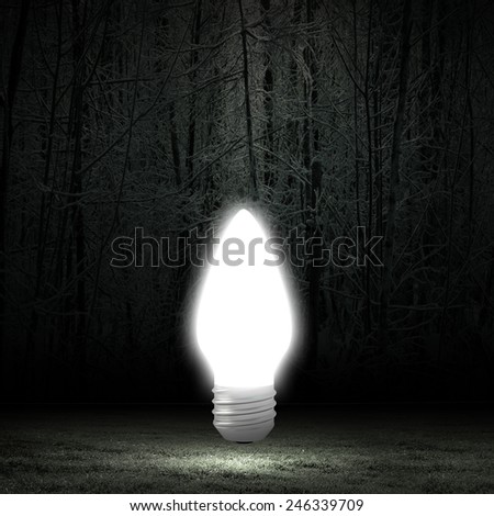 Background image with glowing light bulb. Energy saving
