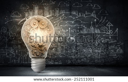 Close up of light bulb and gears mechanism