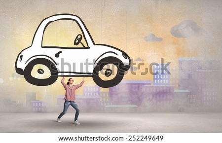 Young girl lifting drawn car above her head