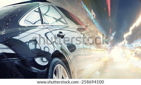 Night blurred city lights of streets and moving cars