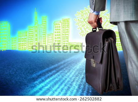 Bottom view of businessman with suitcase in hand