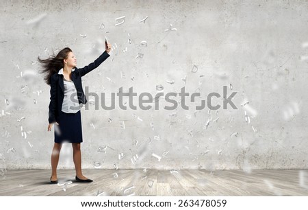 Young businesswoman screaming with rage in mobile phone