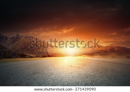 Nature landscape of sunset light above asphalt road
