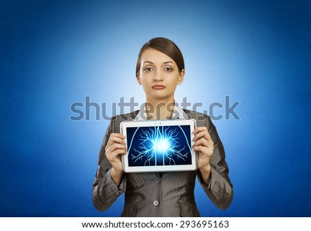 Woman holding tablet pc with brain concept