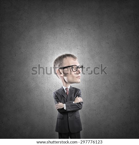 Young funny man in glasses with big head