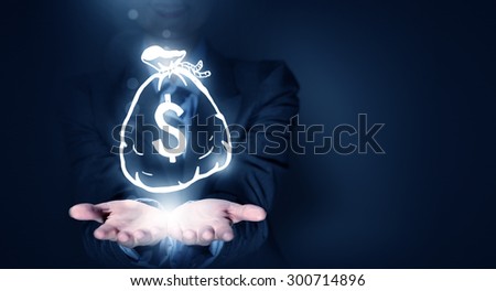 Close up of businesswoman hand holding digital dollar sign