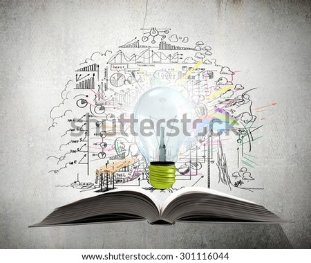Old opened book with business sketches over white background