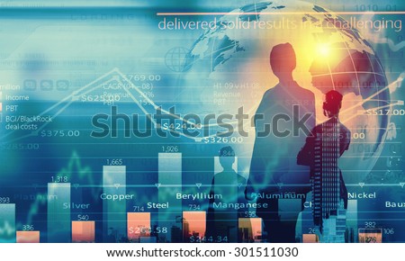 Back view of businesswoman and graphs at background
