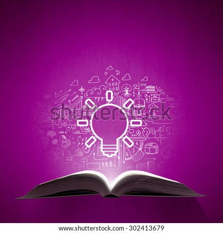 Old opened book with business sketches over purple background
