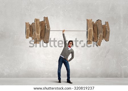 Confident businessman lifting above head sketched barbell